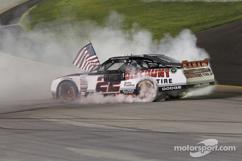 Race winner Brad Keselowski celebrates