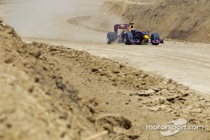 David Coulthard drives the Red Bull F1 car on the Circuit of the Americas in construction
