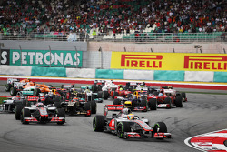 Lewis Hamilton, McLaren leads at the start of the race
