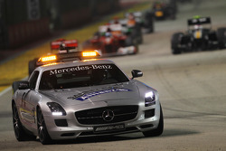 Sebastian Vettel, Red Bull Racing leads behind the Safety Car