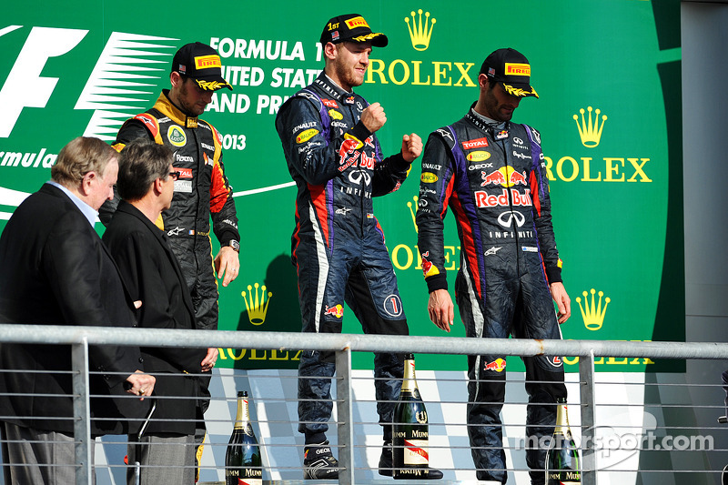 2013. Подіум: 1. Себастьян Феттель, Red Bull-Renault. 2. Ромен Грожан, Lotus-Renault. 3. Марк Веббер, Red Bull-Renault