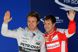 Il Poleman Nico Rosberg, Mercedes AMG F1 W06 e il terzo qualificato Sebastian Vettel, Ferrari SF15-T