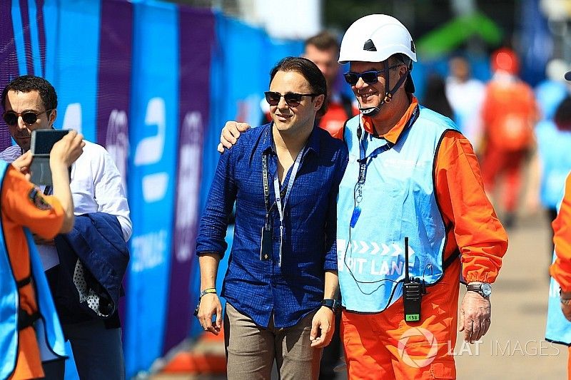 Felipe Massa poses for a photograph with a Marshall