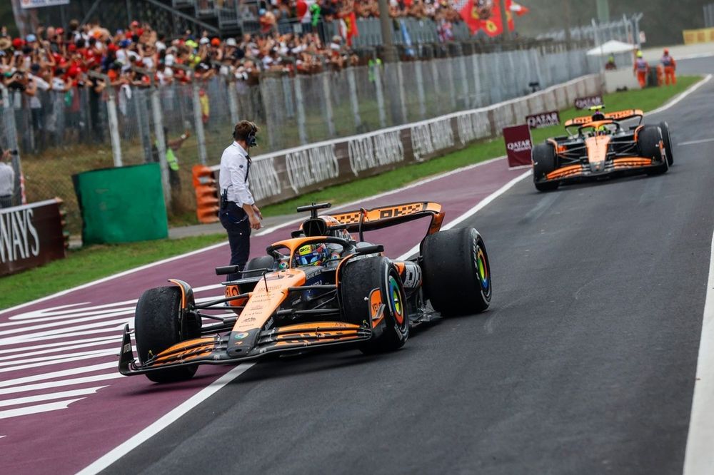 Oscar Piastri, McLaren MCL38, 2nd position, Lando Norris, McLaren MCL38, 3rd position, into Parc Ferme at the end of the race