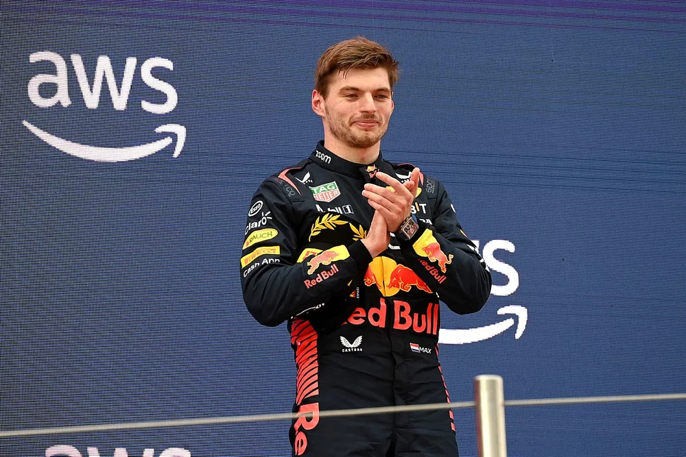 Max Verstappen, Red Bull Racing, 1st position, claps on the podium