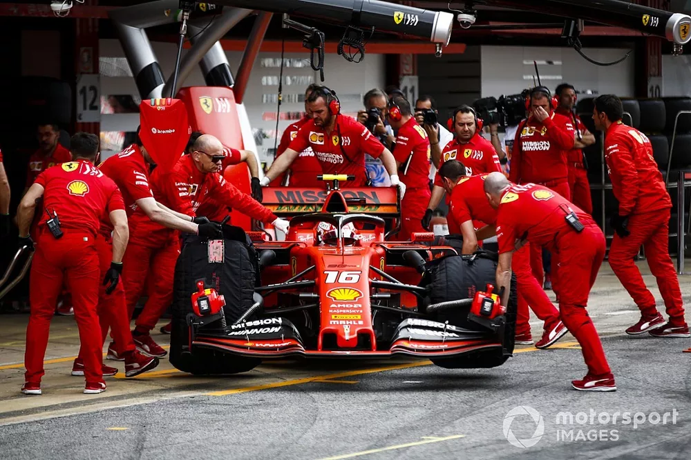 Charles Leclerc, Ferrari SF90, is returned to the garage
