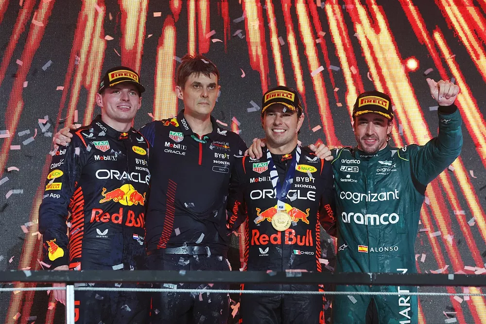 Max Verstappen, Red Bull Racing, 2nd position, the Red Bull trophy delegate, Sergio Perez, Red Bull Racing, 1st position, Fernando Alonso, Aston Martin F1 Team, provisionally 3rd position, on the podium