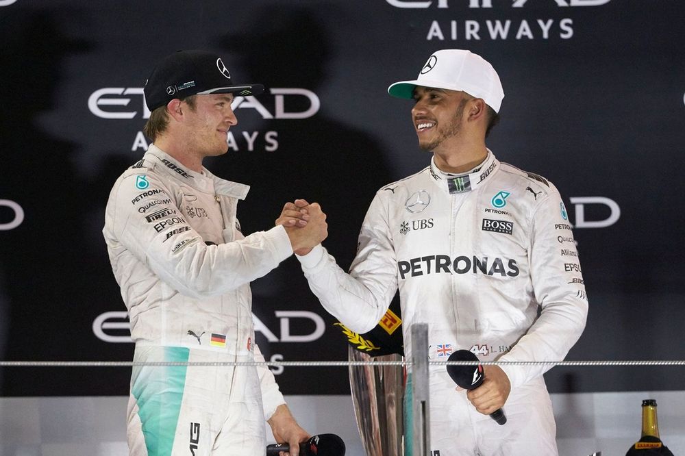 World Champion Nico Rosberg, Mercedes AMG F1 shakes hands with team mate and race winner Lewis Hamilton, Mercedes AMG F1
