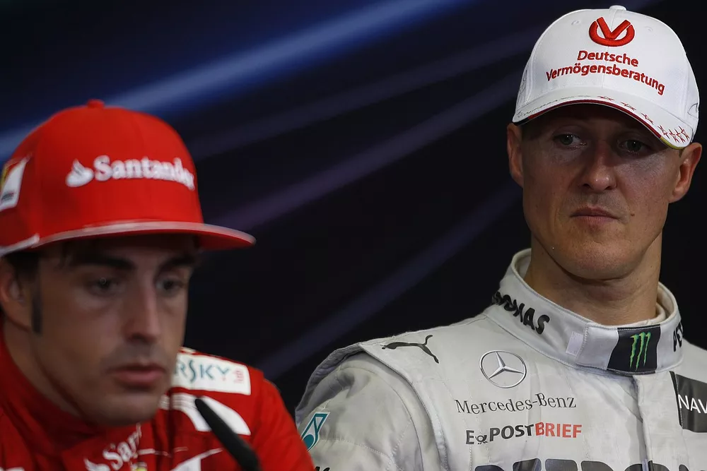 Valencia Street Circuit, Valencia, Spain24th June 2012.Fernando Alonso, Ferrari, 1st position, and Michael Schumacher, Mercedes AMG, 3rd position, in the Press Conference. World Copyright:Charles Coates/LAT Photographicref: Digital Image _X5J9595