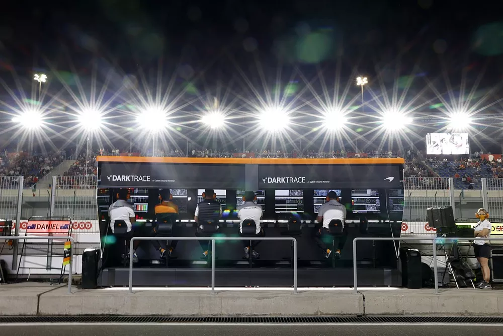 The McLaren team on the pit wall