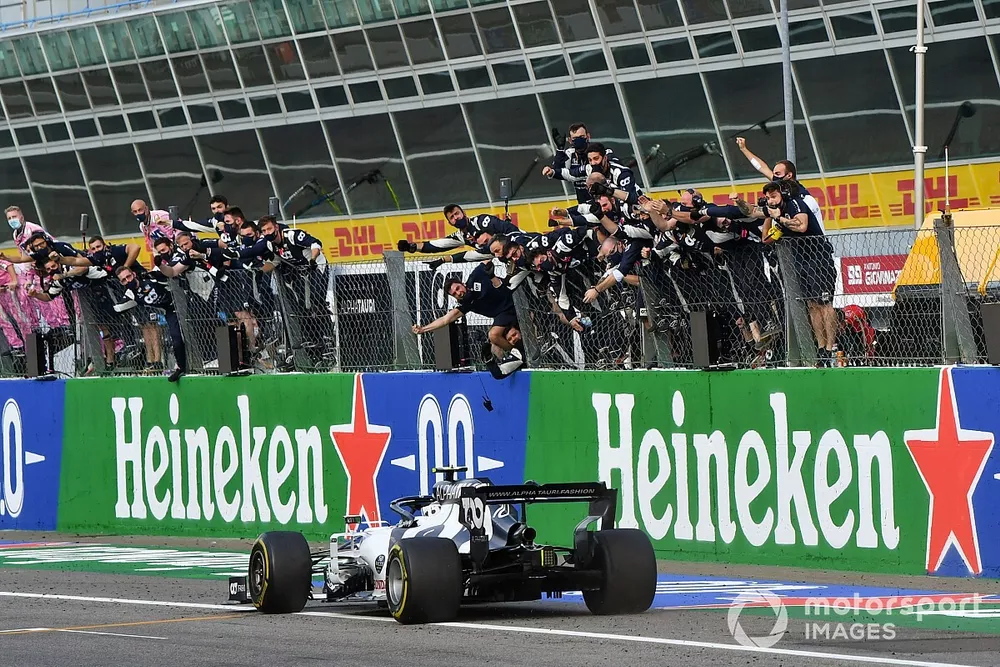 Race winner Pierre Gasly, AlphaTauri AT0, 1st position, passes his team on the pit wall  