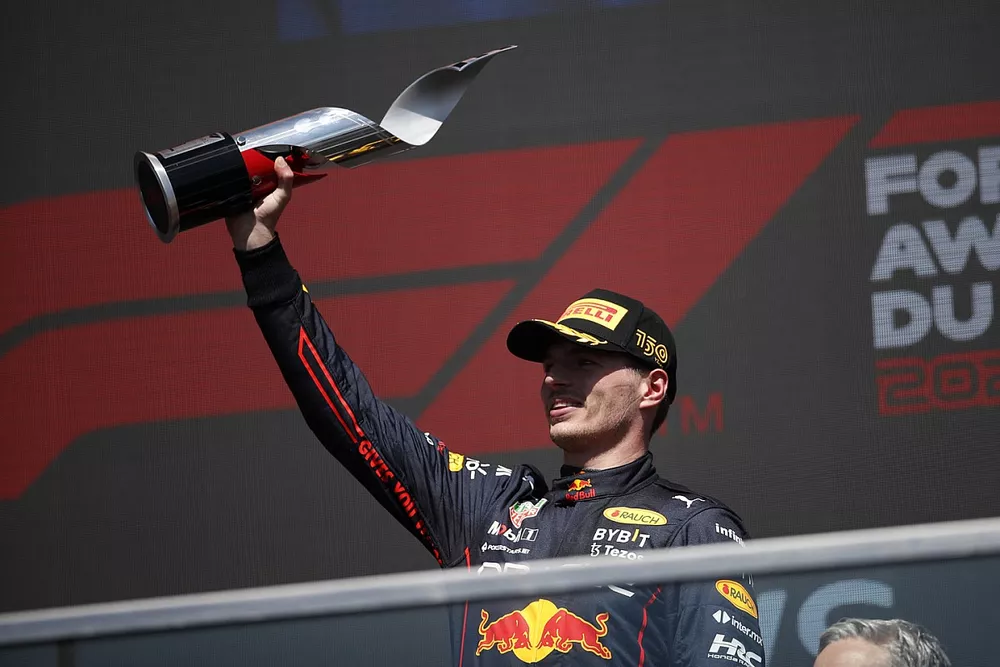 Max Verstappen, Red Bull Racing, 1st position, lifts his trophy