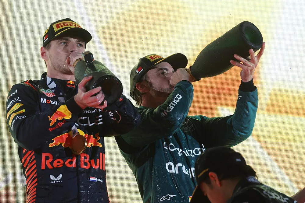 Max Verstappen, Red Bull Racing, 1st position, Fernando Alonso, Aston Martin F1 Team, 3rd position, celebrate on the podium