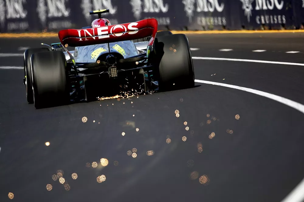 Lewis Hamilton, Mercedes W13, kicks up some sparks