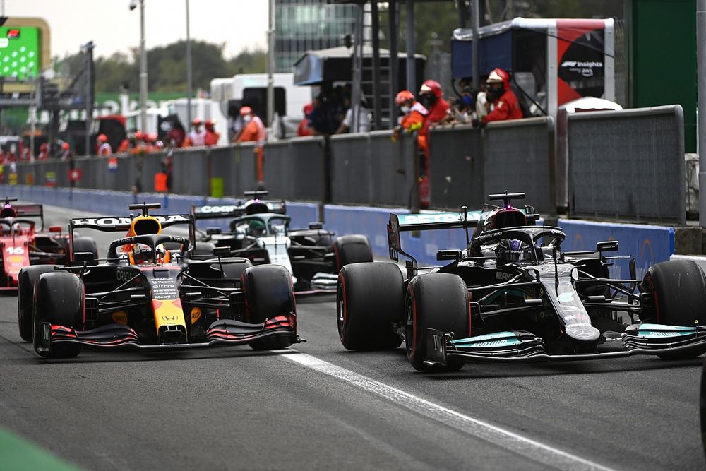 Lewis Hamilton, Mercedes W12, Max Verstappen, Red Bull Racing RB16B, in the pit lane