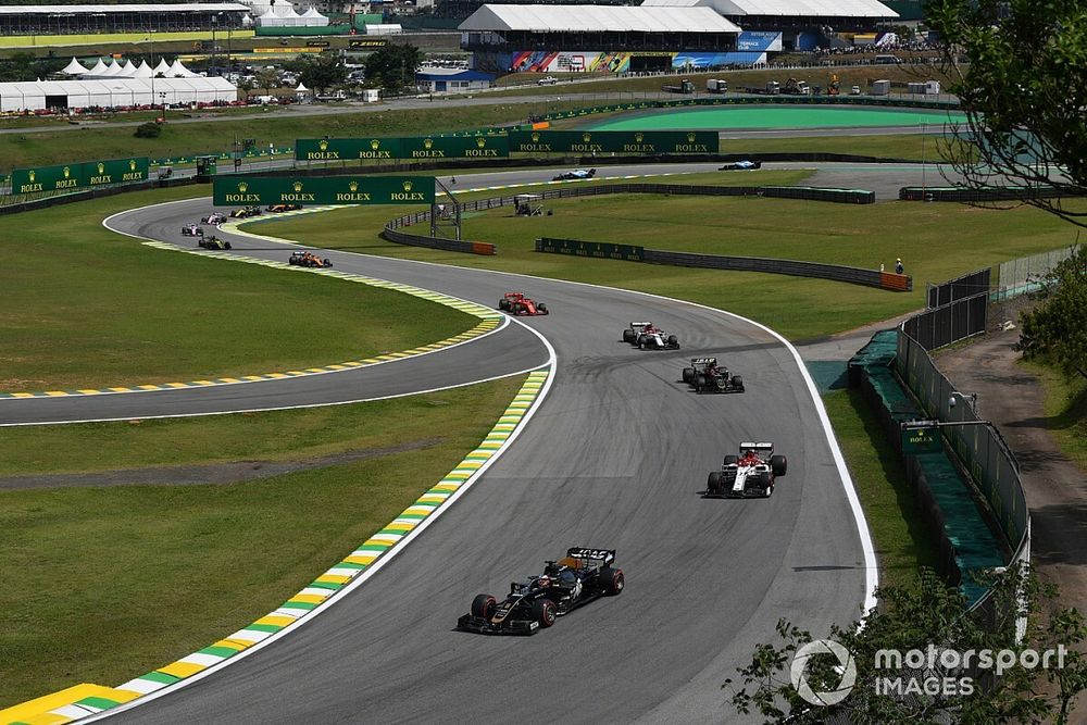 Romain Grosjean, Haas F1 Team VF-19, leads Kimi Raikkonen, Alfa Romeo Racing C38, Kevin Magnussen, Haas F1 Team VF-19, and Antonio Giovinazzi, Alfa Romeo Racing C38