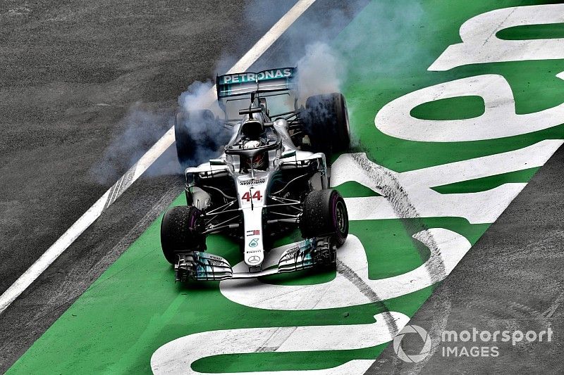 Lewis Hamilton, Mercedes-AMG F1 W09 EQ Power+ celebrates with donuts 