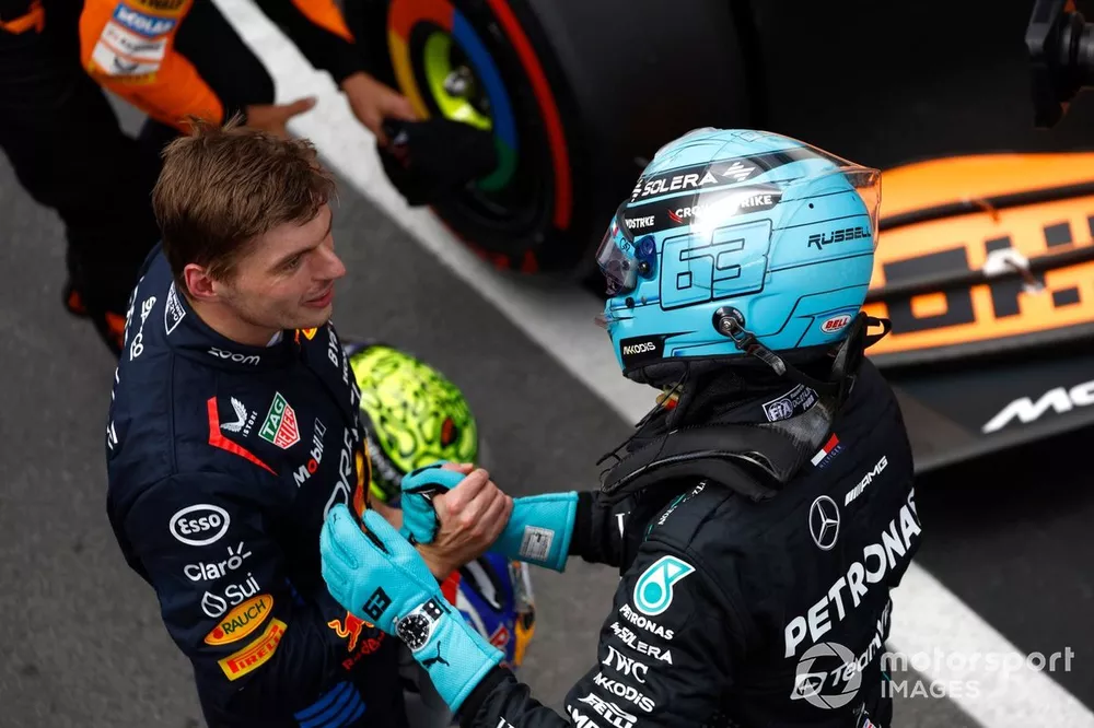Pole man George Russell, Mercedes-AMG F1 Team, is congratulated by Max Verstappen, Red Bull Racing, after Qualifying