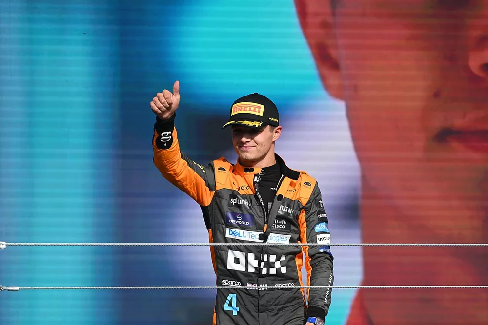 Lando Norris, McLaren, 2nd position, waves from the podium