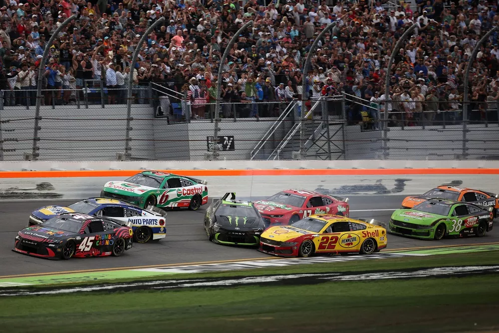 Tyler Reddick, No. 45 23XI Racing Toyota wins the Daytona 500 as rivals crash behind him