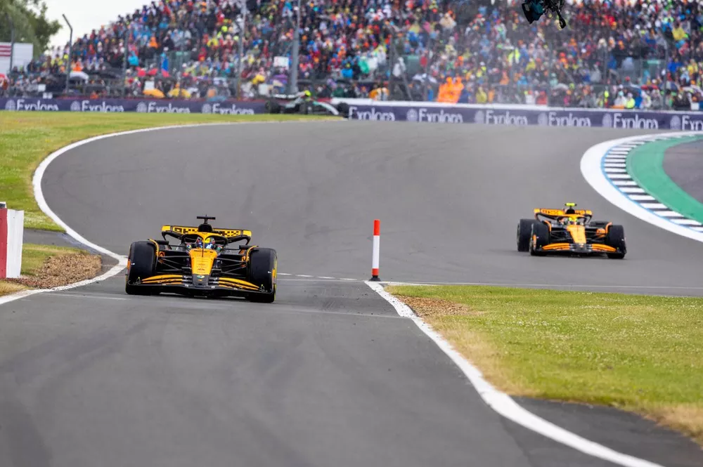 Oscar Piastri, McLaren MCL38, leads Lando Norris, McLaren MCL38