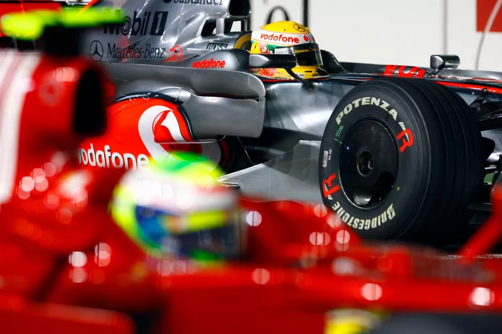 Felipe Massa, Ferrari F2008, and Lewis Hamilton, McLaren MP4-23 Mercedes