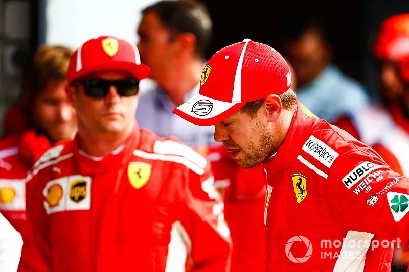 El poleman Kimi Raikkonen, Ferrari, y Sebastian Vettel, Ferrari