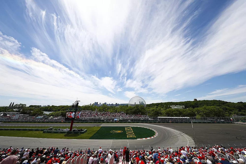 Red and white colours of Canada abound in the grandstands around the Turn 10 hairpin