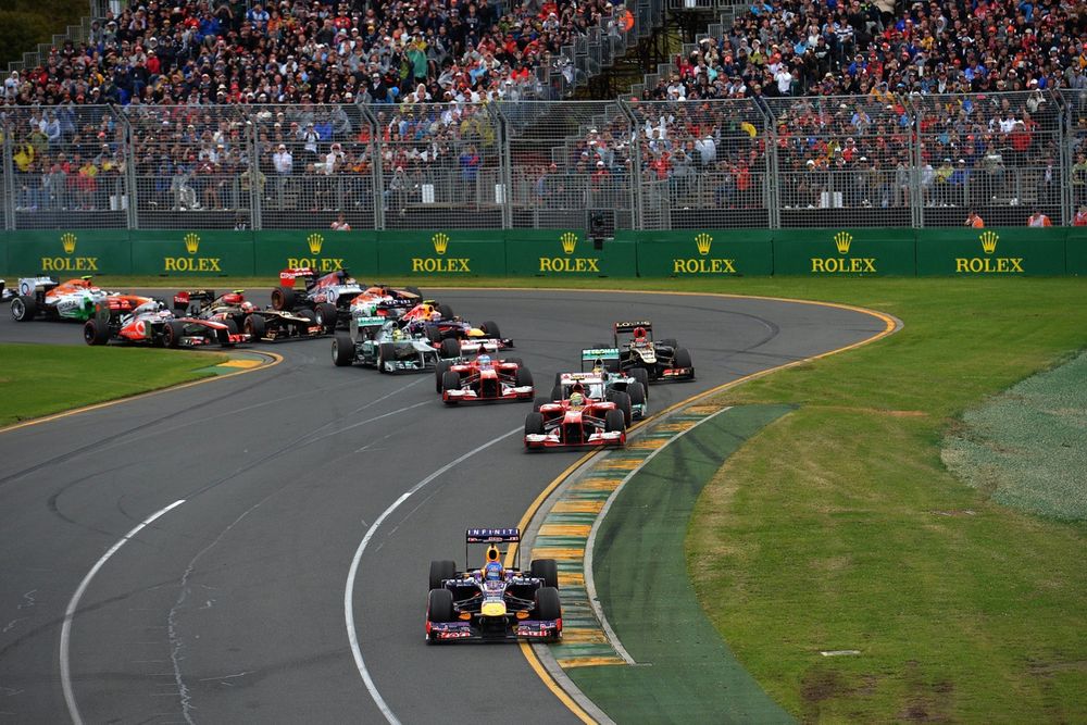 Sebastian Vettel, Red Bull Racing RB9, leads at the start of the race