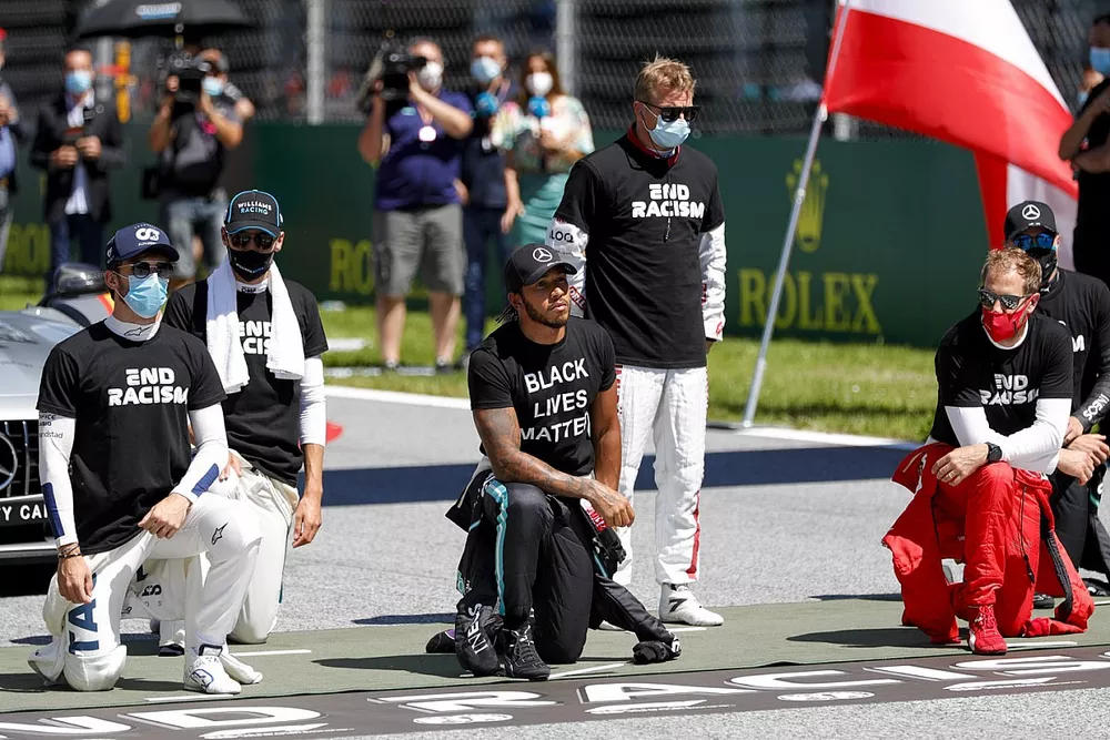 Nicholas Latifi, Williams Racing, George Russell, Williams Racing, Lewis Hamilton, Mercedes-AMG Petronas F1, Kimi Raikkonen, Alfa Romeo, Sebastian Vettel, Ferrari, and Valtteri Bottas, Mercedes-AMG Petronas F1, on the grid, taking the knee in support of the Black Lives Matter campaign