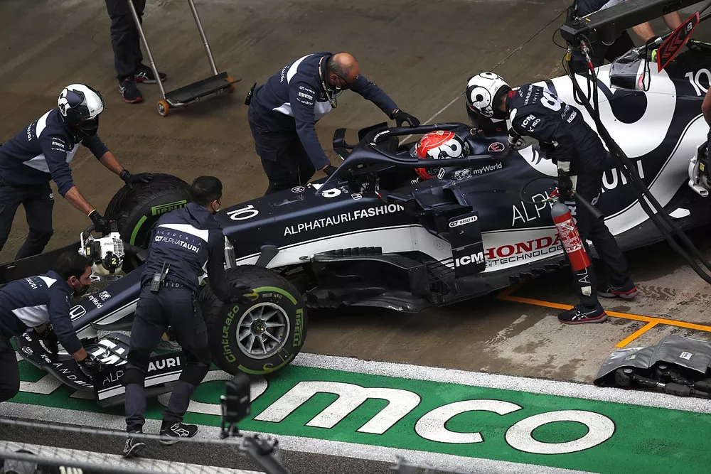 Pierre Gasly, AlphaTauri AT02, is returned to the garage