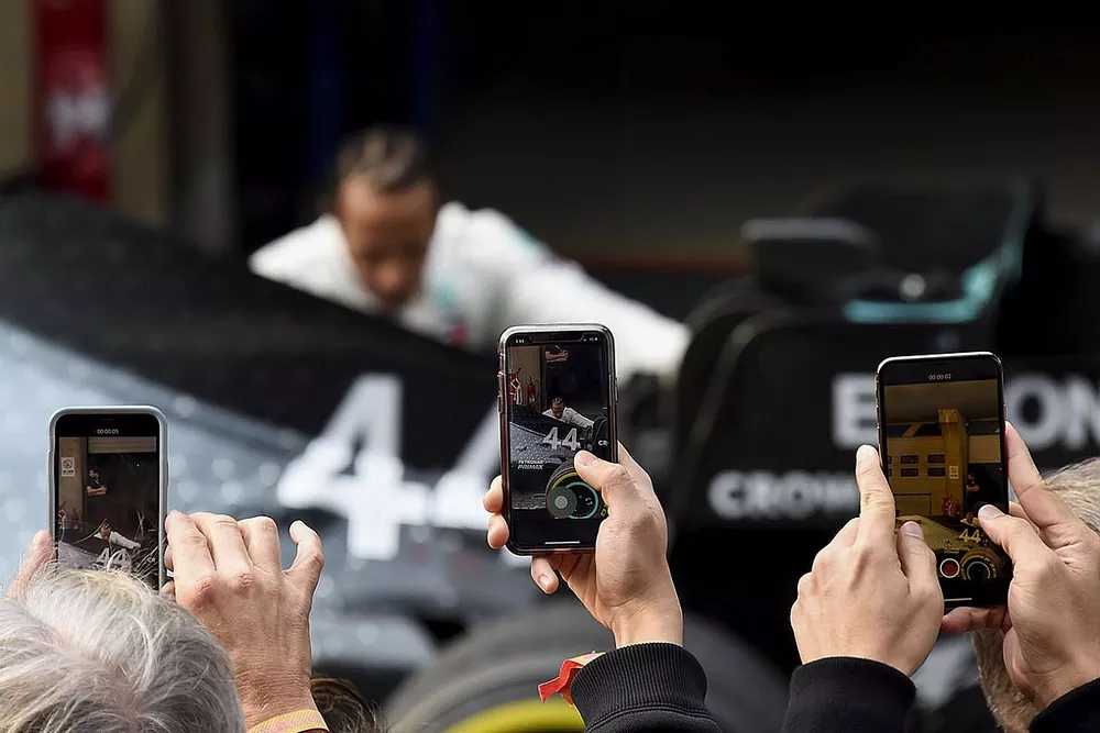 Photos are taken with phones as Lewis Hamilton, Mercedes AMG F1, 1st position, inspects his car in Parc Ferme