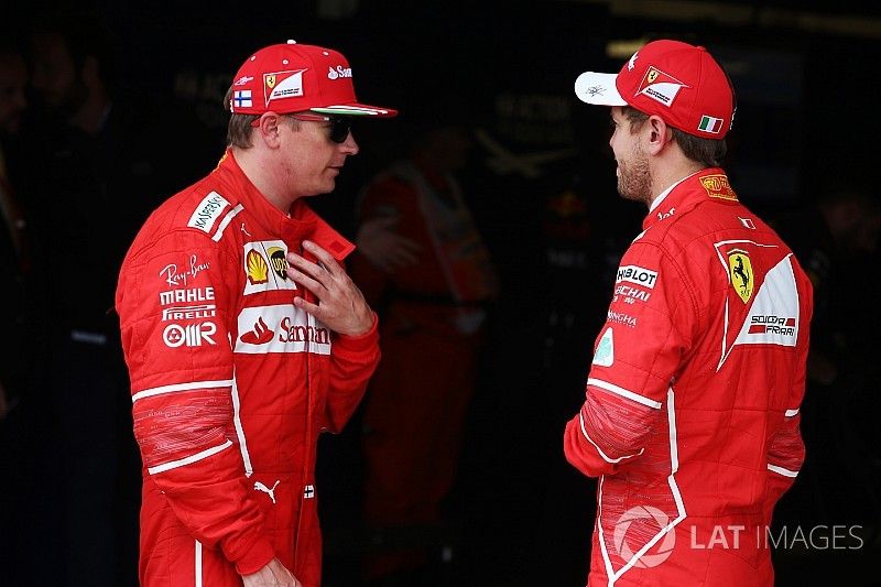 Kimi Raikkonen, Ferrari, with Sebastian Vettel, Ferrari