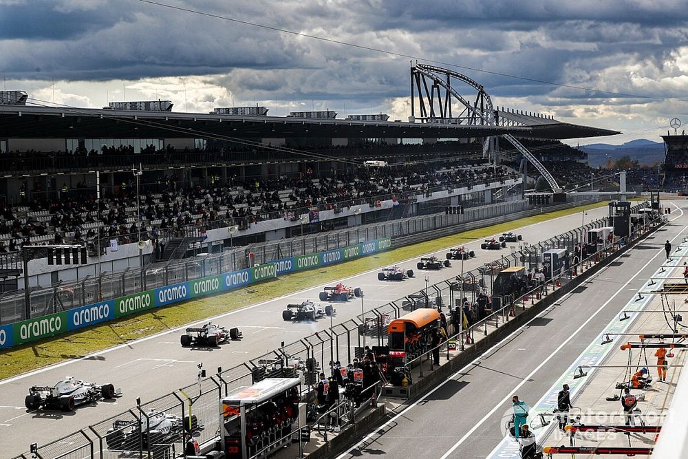 Cars line up on the grid before the start of the race