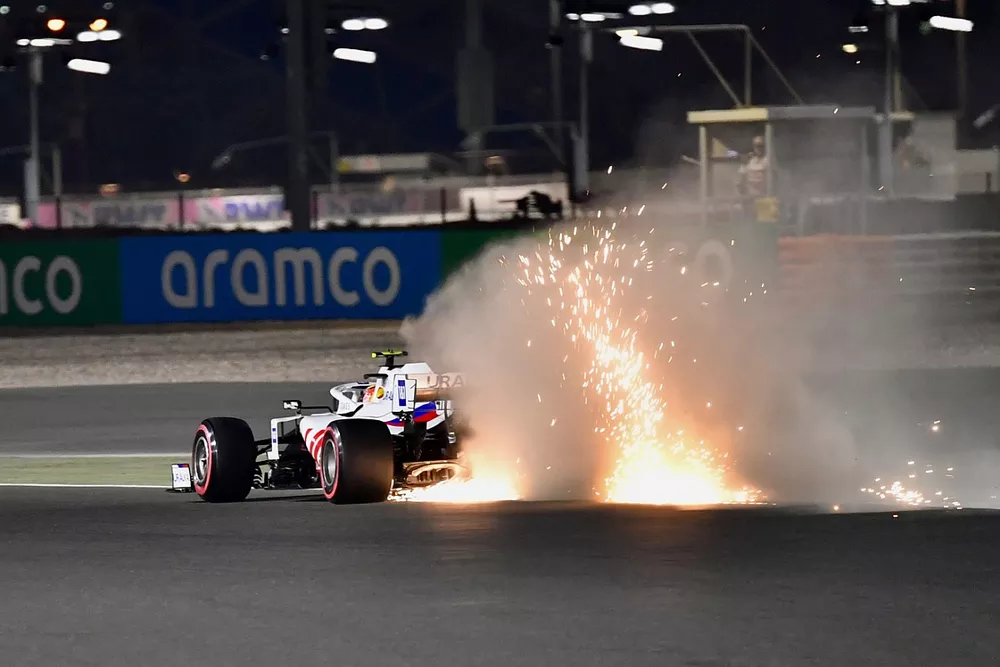 Sparks fly from Mick Schumacher, Haas VF-21