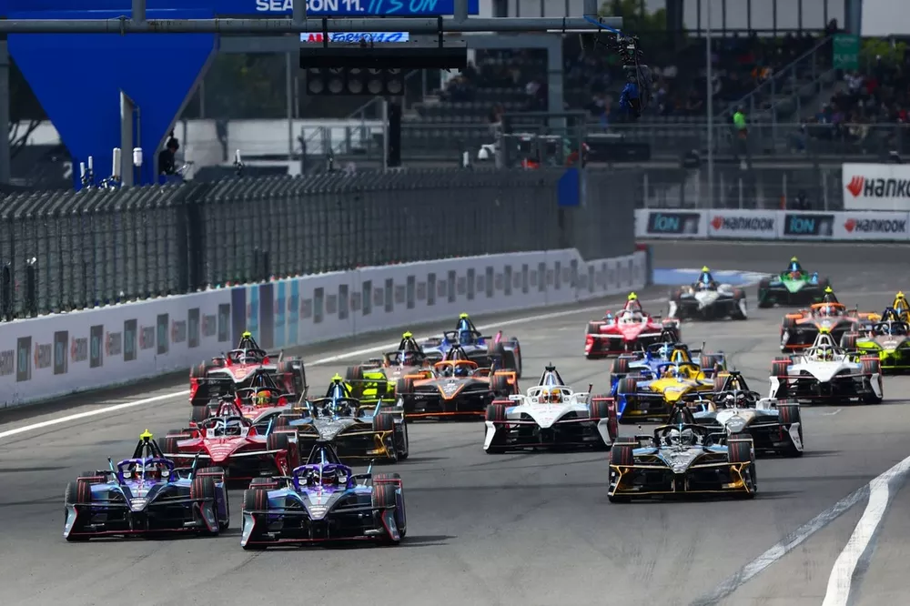Pascal Wehrlein TAG Heuer Porsche Formula E Team Porsche 99X Electric Gen3 the field into turn one at the start