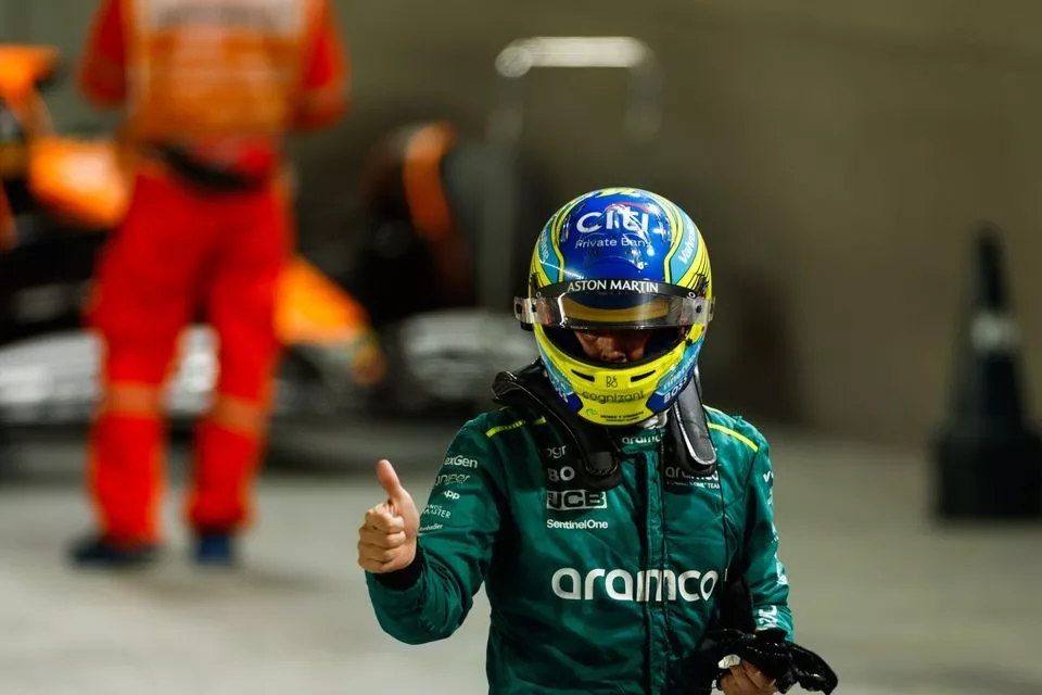 Fernando Alonso, Aston Martin F1 Team, gives a thumbs up after Qualifying