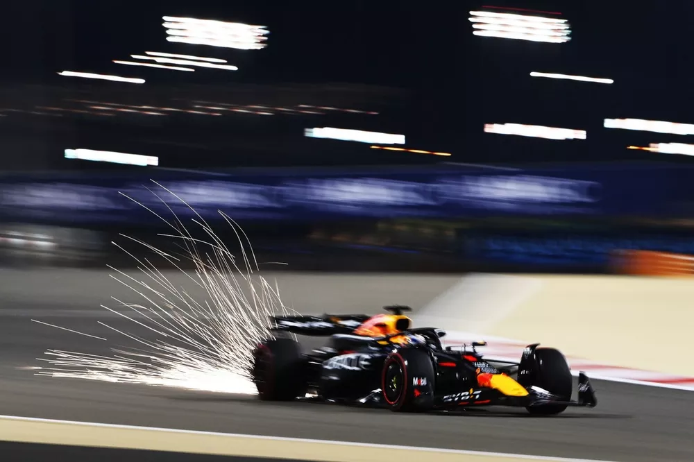 Sparks fly from Max Verstappen, Red Bull Racing RB20