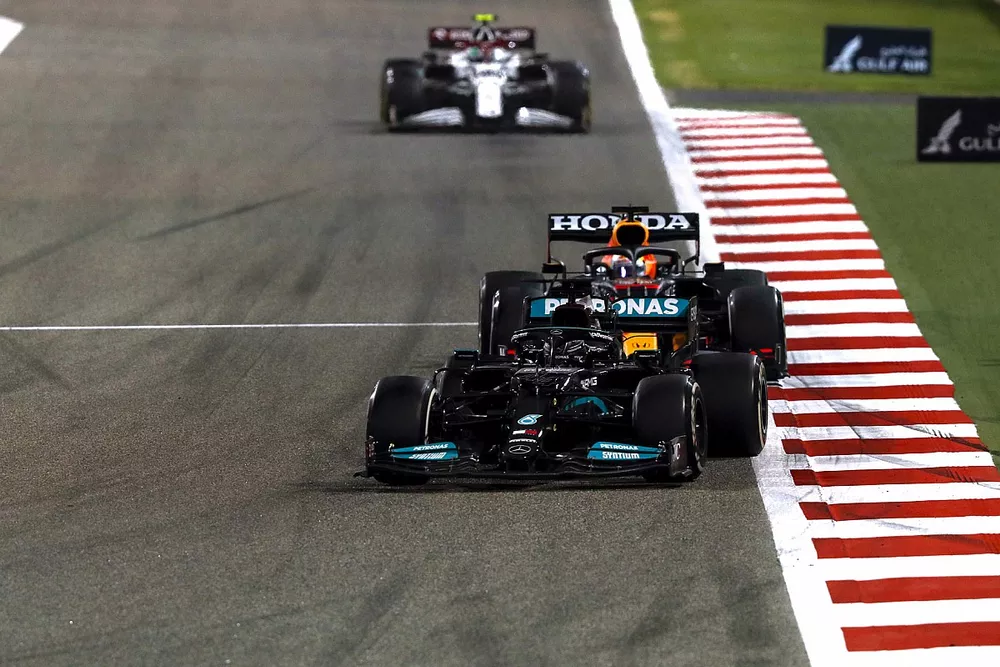 Lewis Hamilton, Mercedes W12 Max Verstappen, Red Bull Racing RB16B 