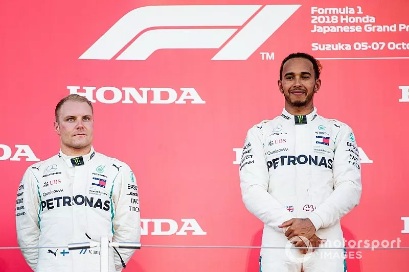 Second place Valtteri Bottas, Mercedes AMG F1, and Race winner Lewis Hamilton, Mercedes AMG F1, on he podium 