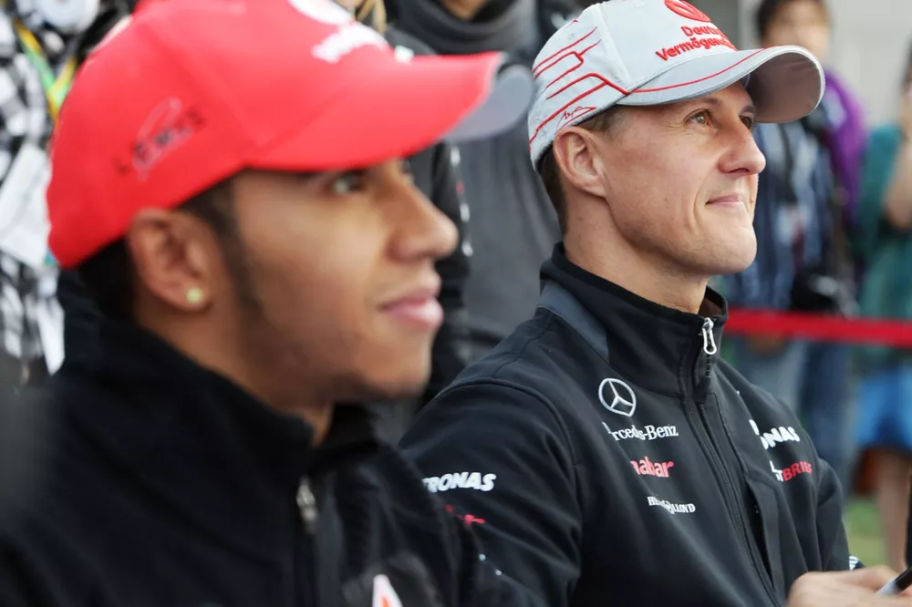 Lewis Hamilton, McLaren and Michael Schumacher, Mercedes GP