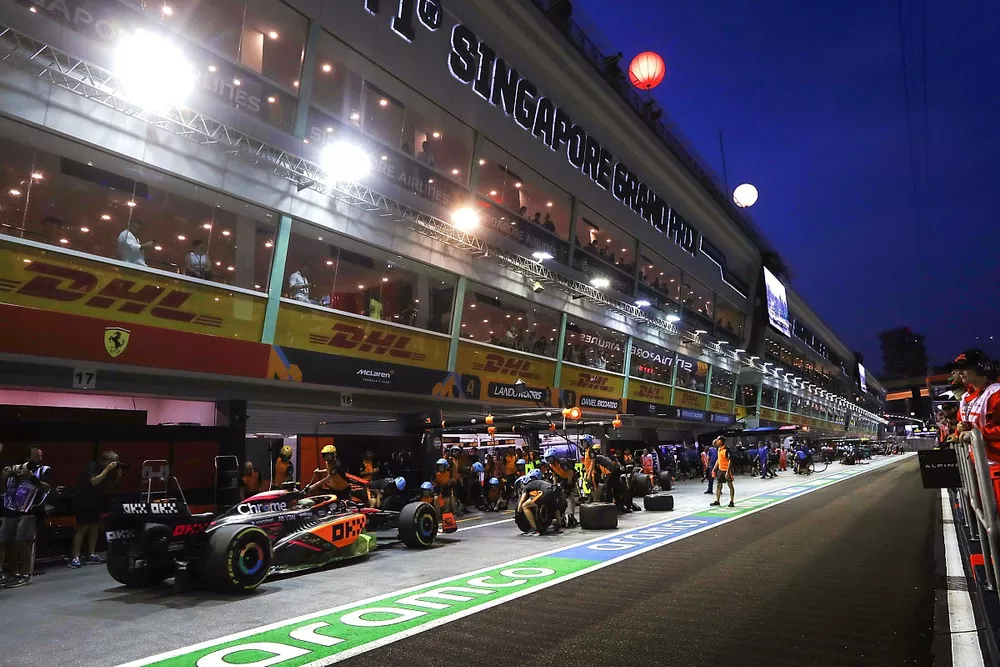 Lando Norris, McLaren MCL36, in the pits during FP1