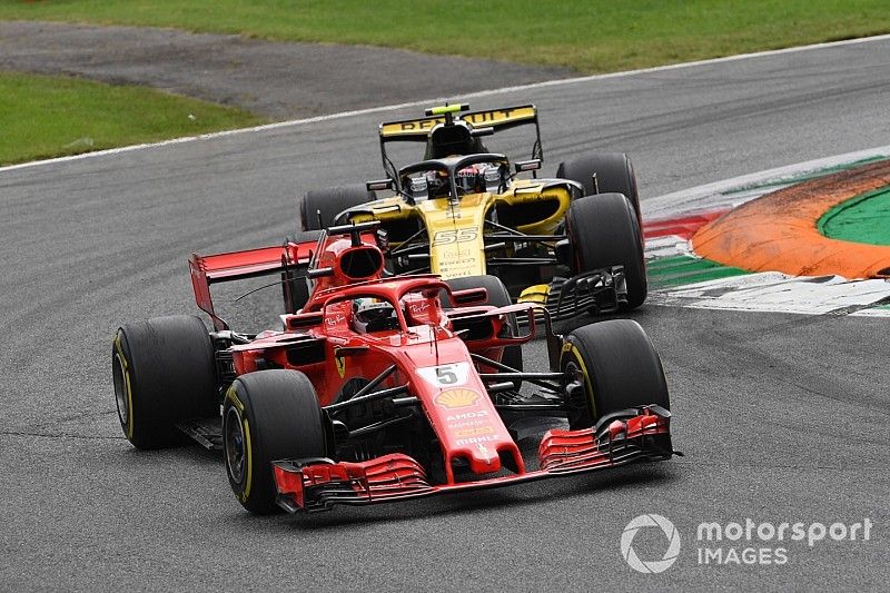 Sebastian Vettel, Ferrari SF71H and Carlos Sainz Jr., Renault Sport F1 Team R.S. 18 