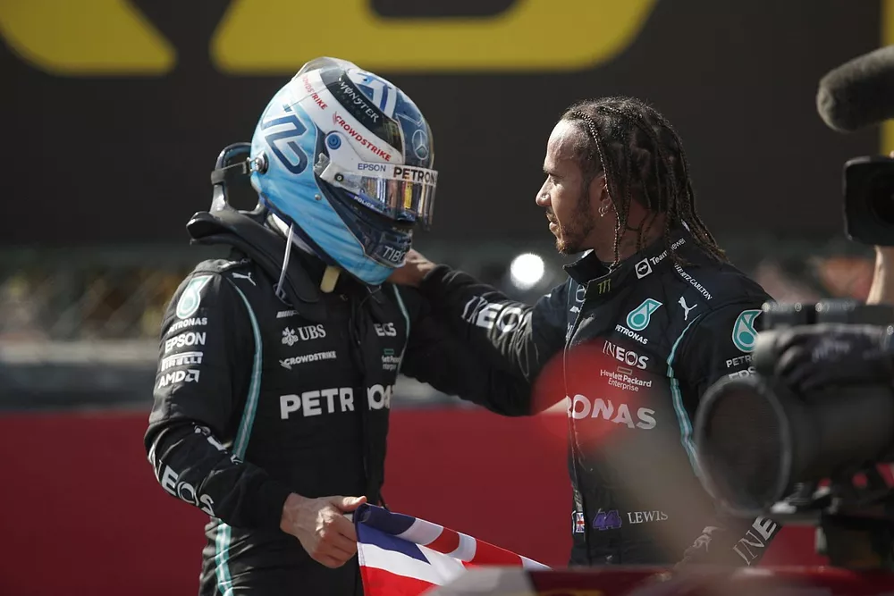 Valtteri Bottas, Mercedes, 3rd position, and Lewis Hamilton, Mercedes, 1st position, congratulate each other in Parc Ferme