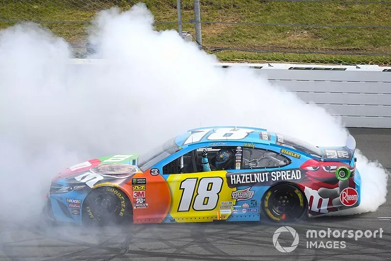 Kyle Busch, Joe Gibbs Racing, Toyota Camry M&M's Hazelnut, celebrates after winning the Pocono 400