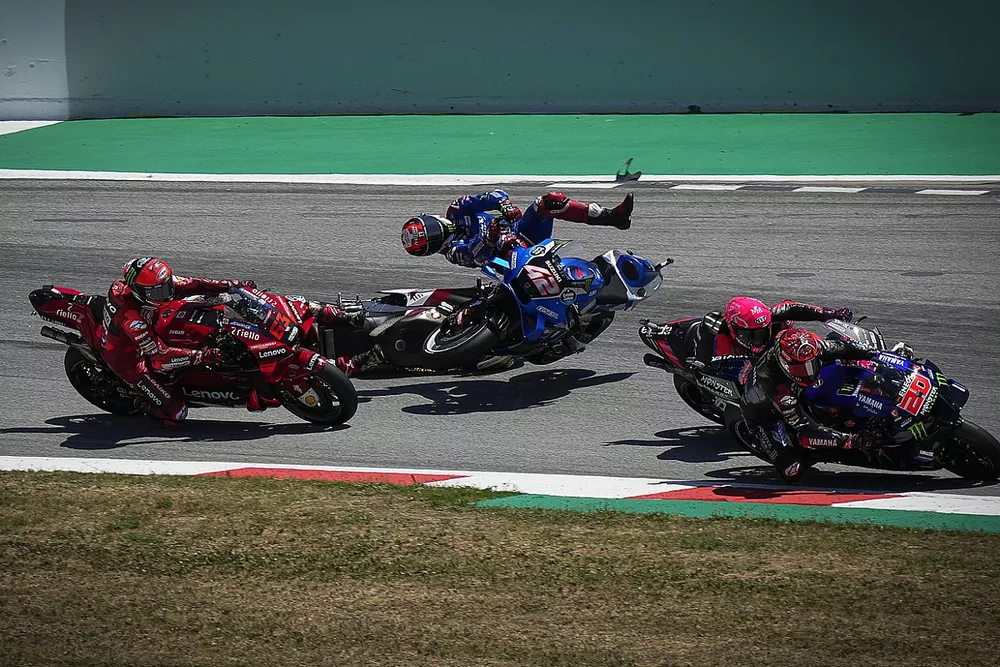 Fabio Quartararo, Yamaha Factory Racing leads, Takaaki Nakagami, Team LCR Honda and Alex Rins, Team Suzuki MotoGP crash, Francesco Bagnaia, Ducati Team behind