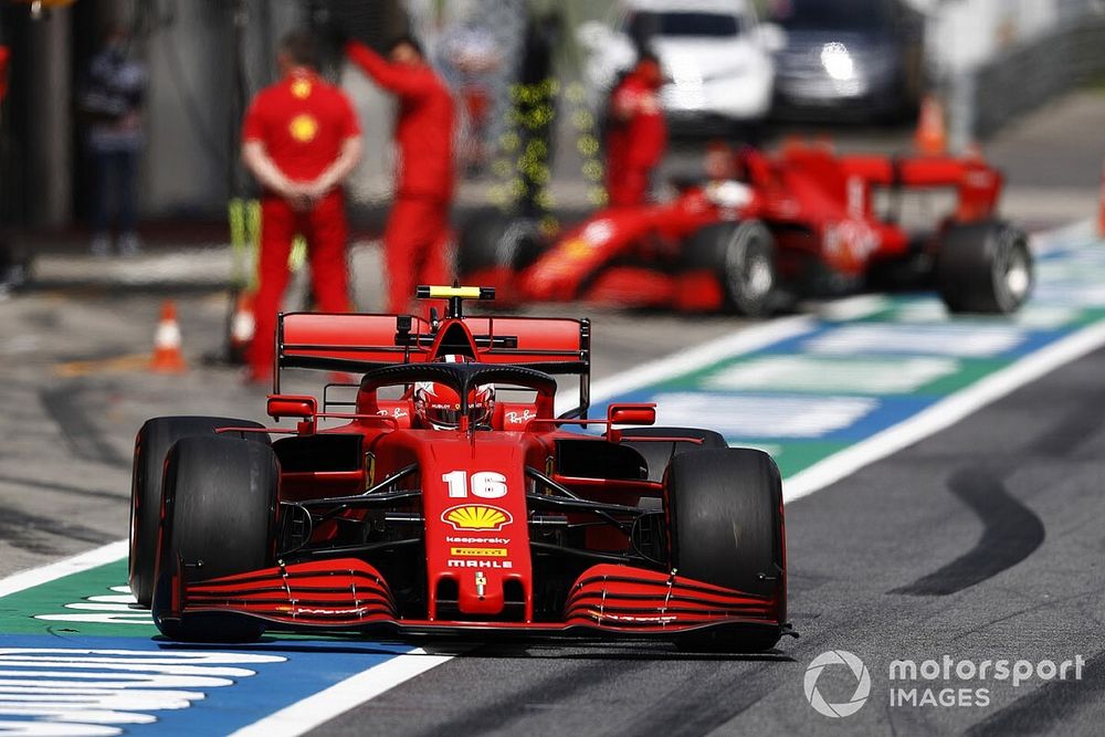 Charles Leclerc, Ferrari SF1000, leaves the pits as Sebastian Vettel, Ferrari SF1000 arrives.