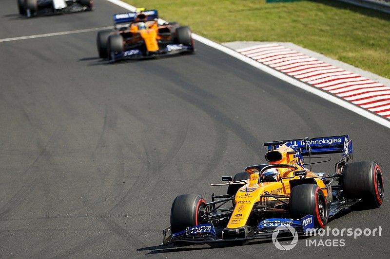 Carlos Sainz Jr., McLaren MCL34, leads Lando Norris, McLaren MCL34