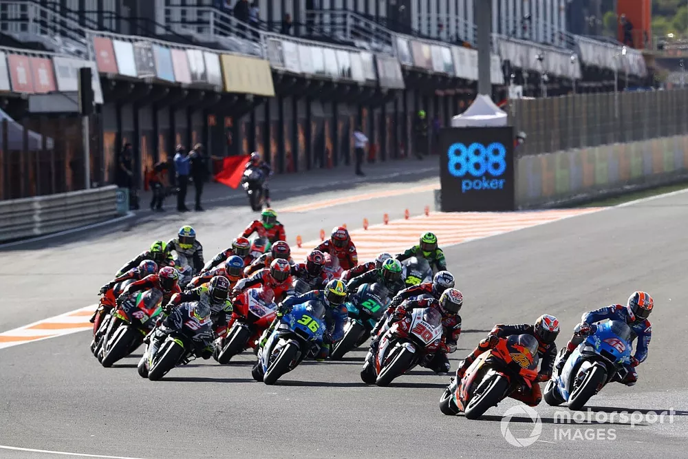 Pol Espargaro, Red Bull KTM Factory Racing leads, Maverick Vinales, Yamaha Factory Racing starts from pit lane