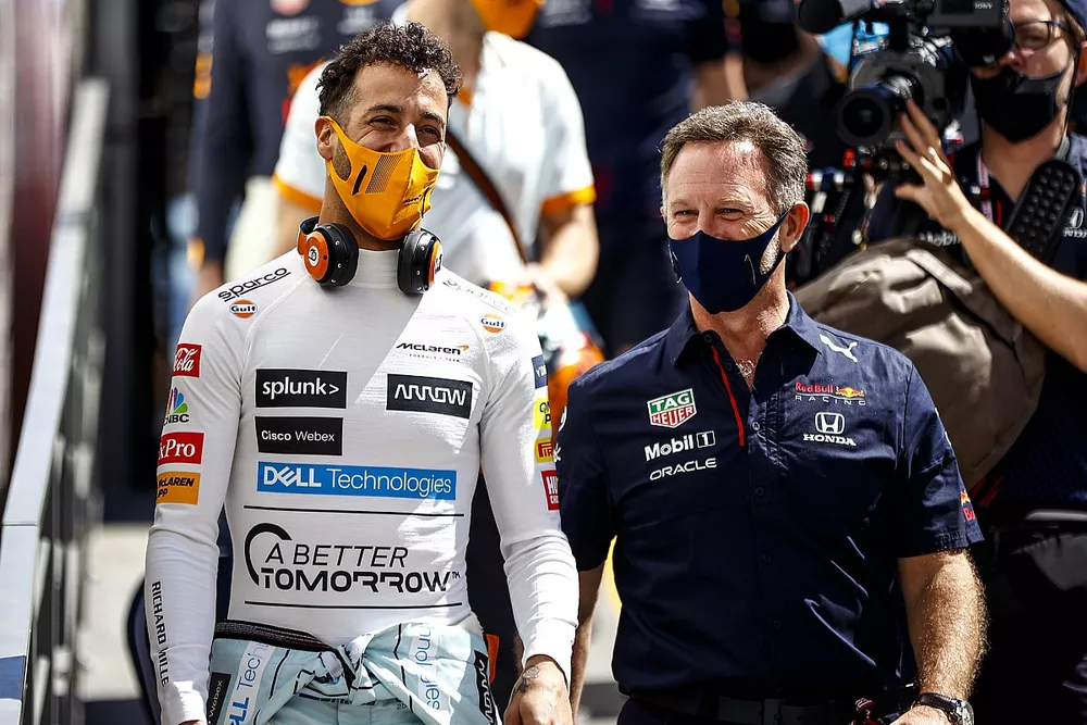 Daniel Ricciardo, McLaren, with Christian Horner, Team Principal, Red Bull Racing